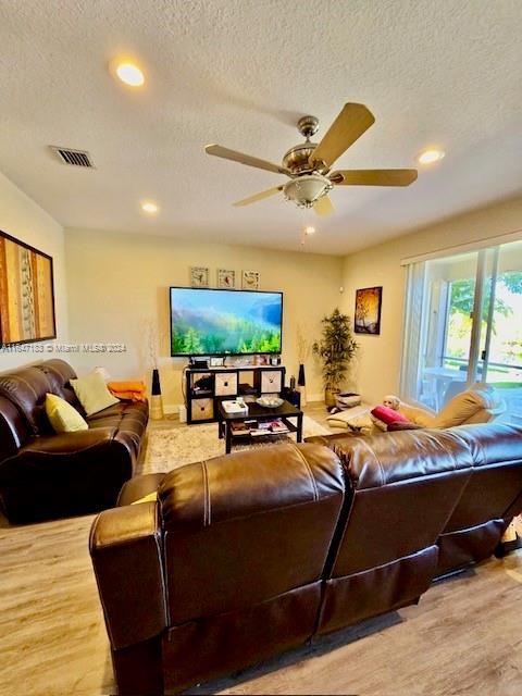 dining space with hardwood / wood-style flooring