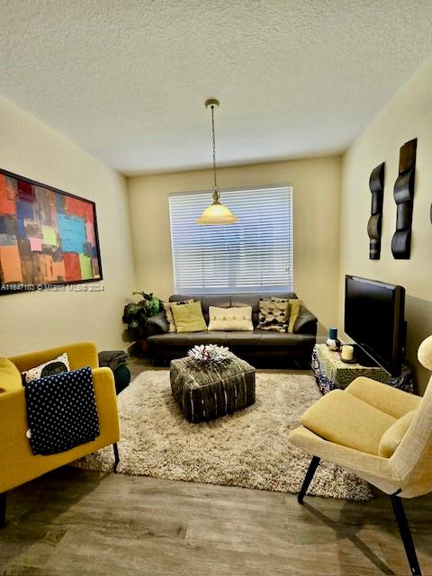 living room with hardwood / wood-style flooring