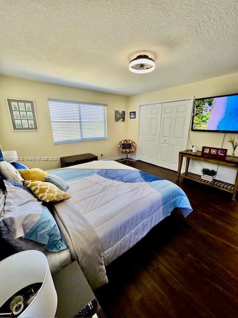 full bathroom featuring vanity, hardwood / wood-style flooring, toilet, and shower / bathtub combination with curtain