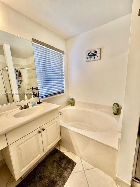 bathroom featuring separate shower and tub and tile patterned flooring