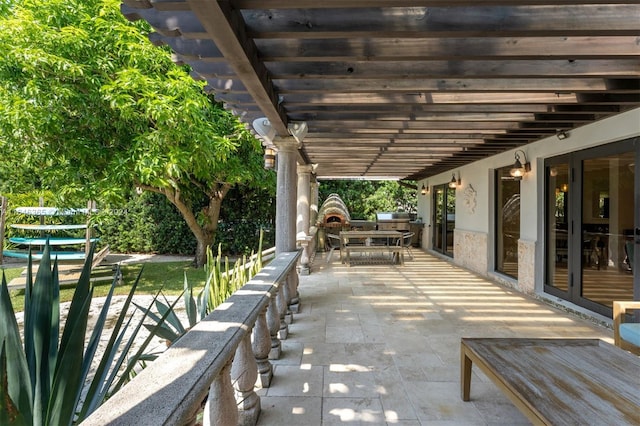 view of patio / terrace featuring a pergola