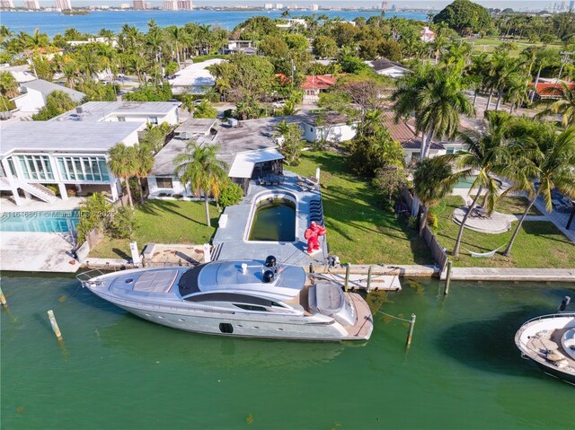 birds eye view of property featuring a water view