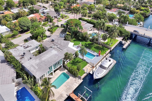 birds eye view of property featuring a water view