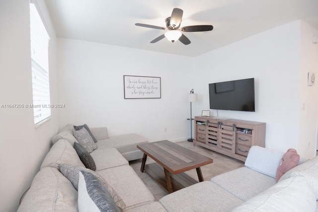 living room with ceiling fan