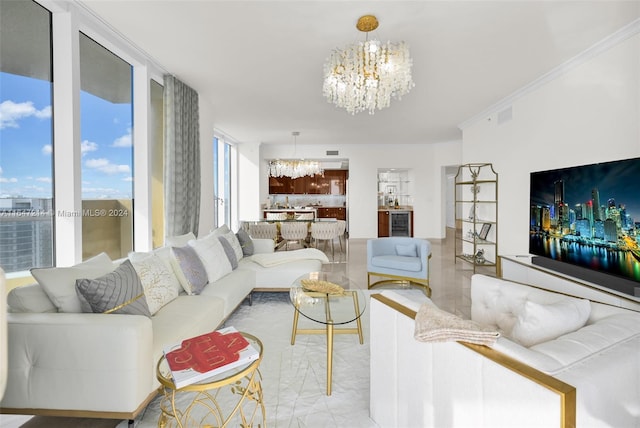 living room with an inviting chandelier, plenty of natural light, expansive windows, and crown molding