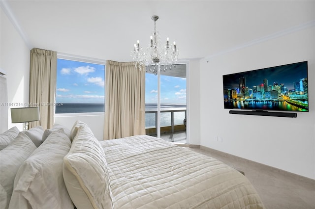 bedroom with ornamental molding, a chandelier, and carpet floors