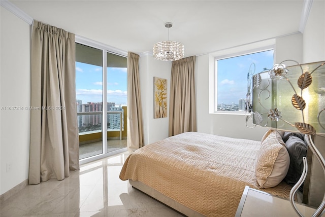 bedroom featuring expansive windows, ornamental molding, a chandelier, and access to exterior