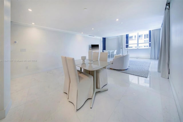 dining space with light tile patterned floors