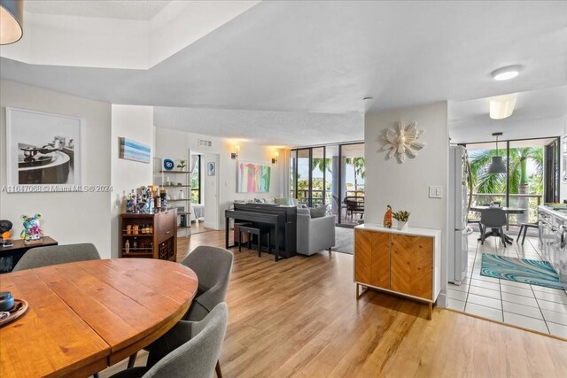 dining room with light hardwood / wood-style floors