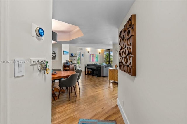 dining space featuring light hardwood / wood-style flooring