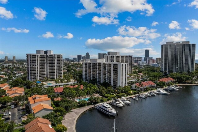 3598 Yacht Club Dr Unit 302, Aventura, FL 33180 - aerial view of city skyline, a marina, and a large body of water