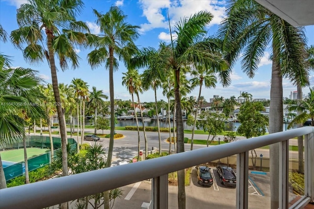 balcony featuring a water view