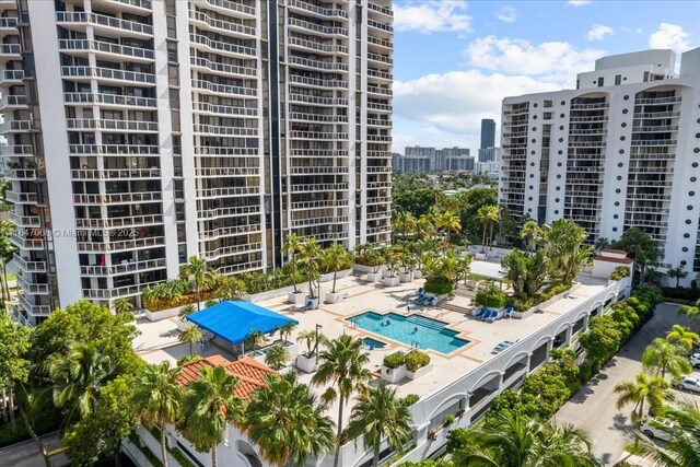 3598 Yacht Club Dr Unit 302, Aventura, FL 33180 - view of apartment building / complex with a view of city and a community pool