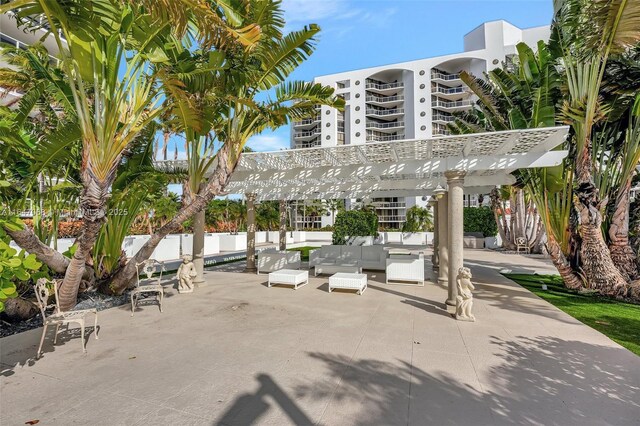 3598 Yacht Club Dr Unit 302, Aventura, FL 33180 - surrounding community featuring an outdoor living space, a pergola, and a patio area