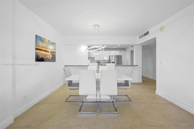 view of tiled dining space