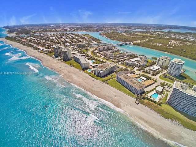 bird's eye view with a beach view and a water view