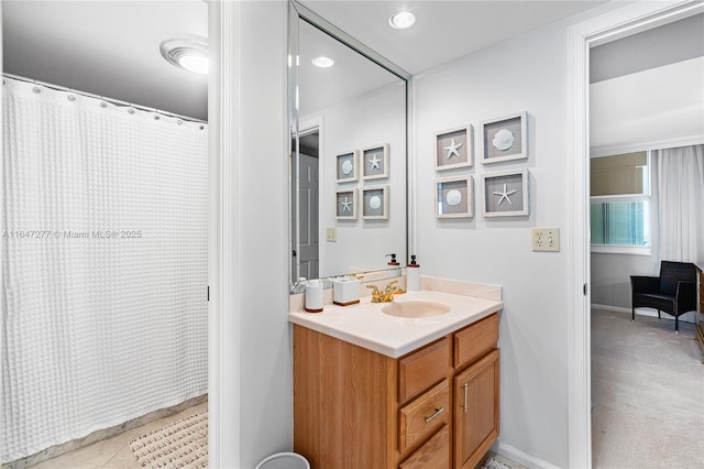 bathroom with recessed lighting, tile patterned floors, vanity, and baseboards