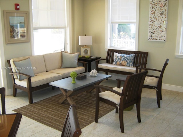 living room featuring light tile patterned floors