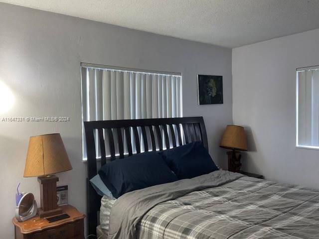 bedroom with a textured ceiling