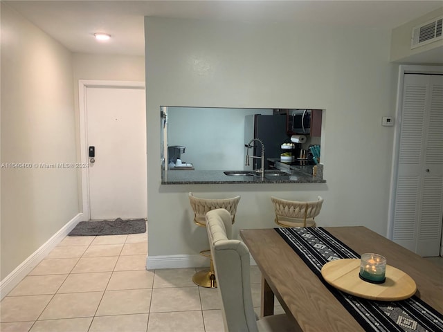 view of tiled dining room