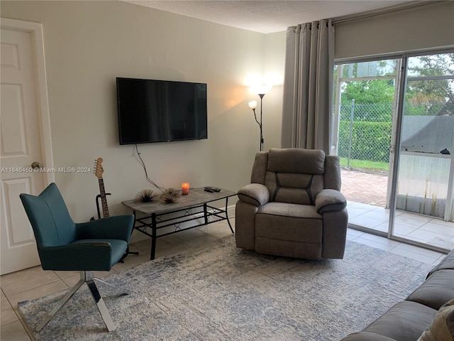 living room with light tile patterned floors