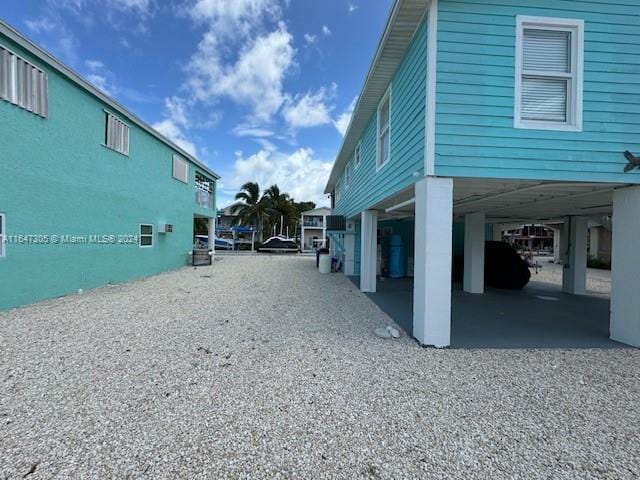 exterior space featuring a carport