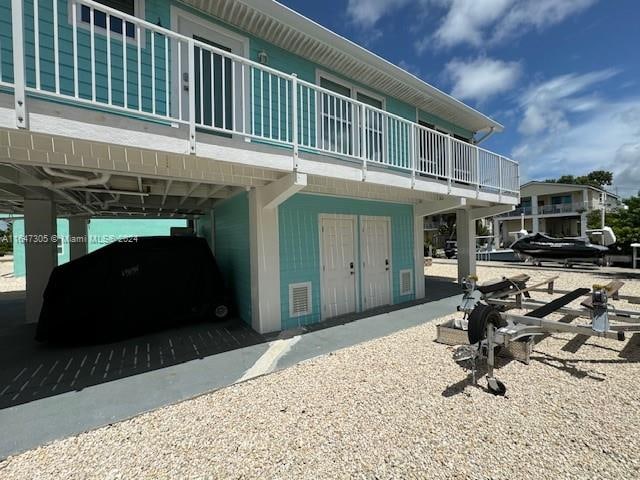 exterior space featuring a balcony