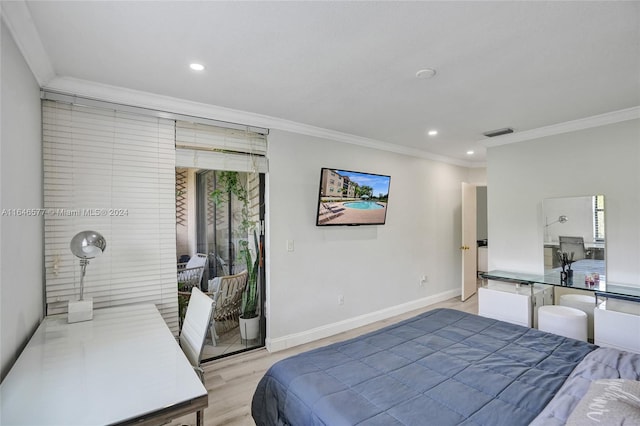 bedroom featuring light hardwood / wood-style floors and ornamental molding