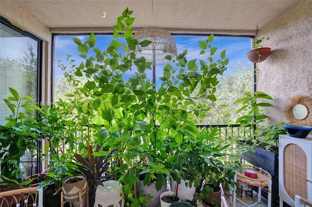 unfurnished sunroom with a wealth of natural light