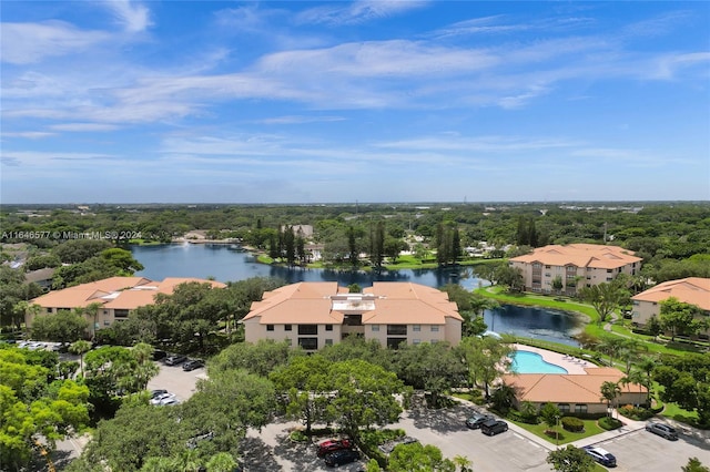 drone / aerial view with a water view