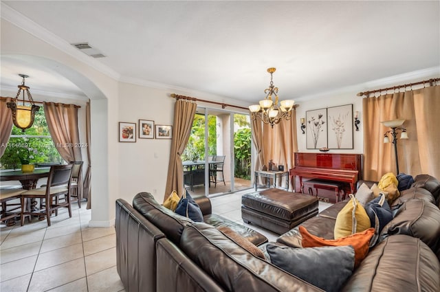 14107 SW 155th St, Miami, FL 33177 - living room with a chandelier, arched walkways, light tile patterned flooring, ornamental molding, and baseboards
