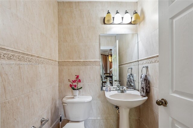 14107 SW 155th St, Miami, FL 33177 - half bathroom with toilet and tile walls