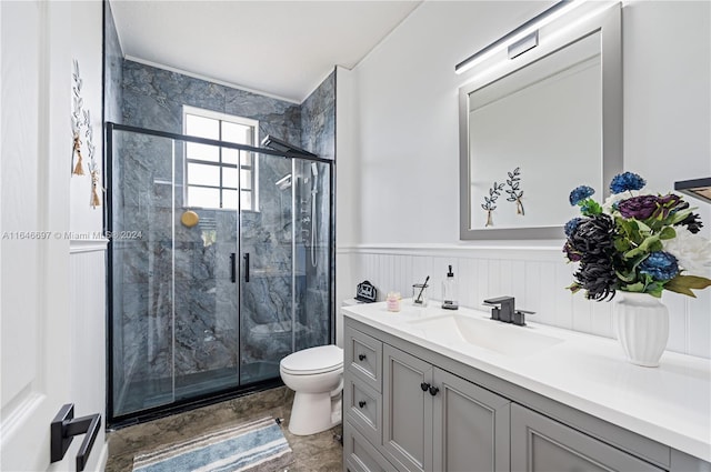 14107 SW 155th St, Miami, FL 33177 - bathroom featuring vanity, toilet, a marble finish shower, and a wainscoted wall