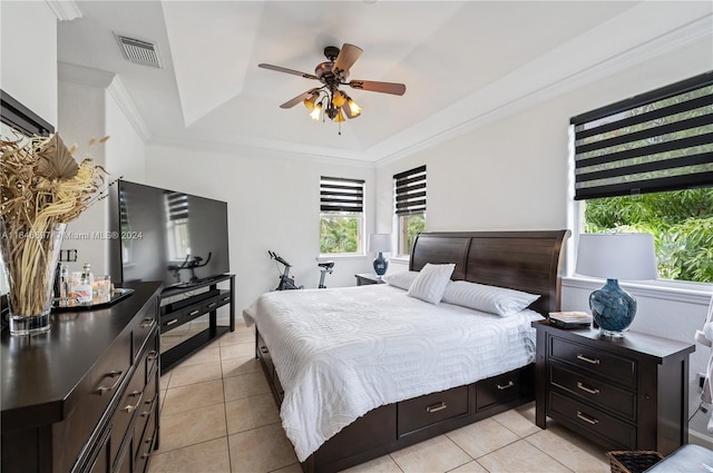 14107 SW 155th St, Miami, FL 33177 - bedroom featuring a tray ceiling, multiple windows, light tile patterned flooring, and crown molding