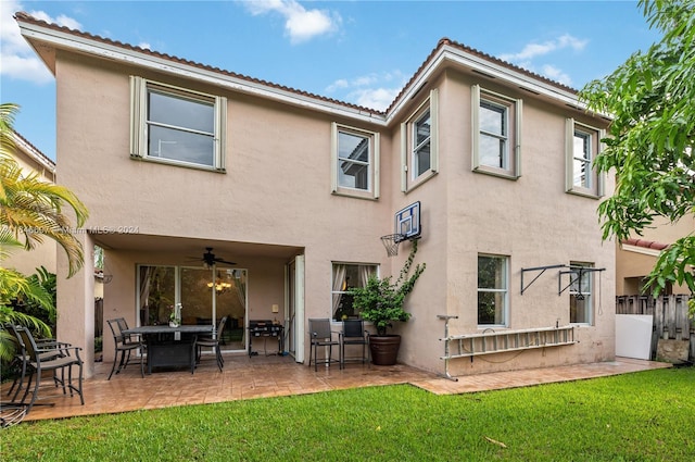 14107 SW 155th St, Miami, FL 33177 - rear view of house featuring ceiling fan, stucco siding, a patio, and a tile roof