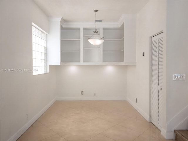 interior space featuring light tile patterned flooring