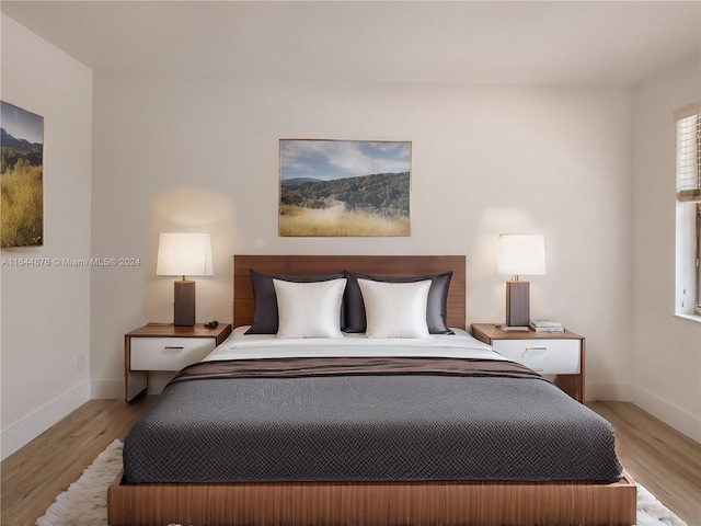 bedroom featuring light wood-type flooring