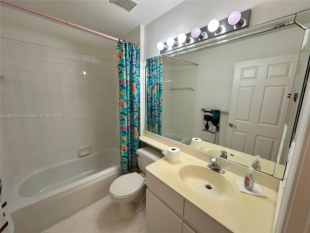 full bathroom with shower / tub combo, toilet, tile patterned floors, and vanity