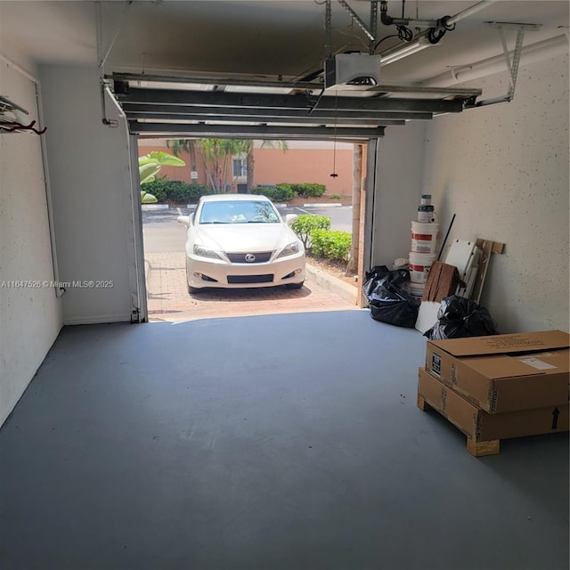 garage featuring a garage door opener