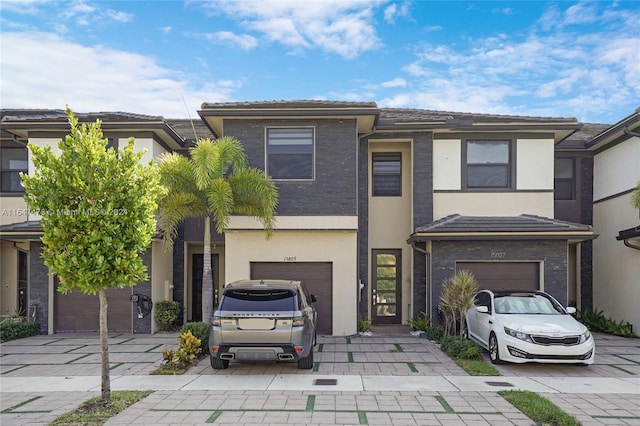 view of front of property featuring a garage