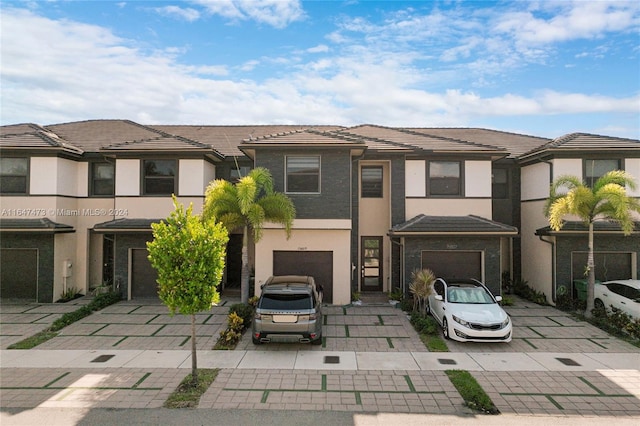 view of front of property featuring a garage