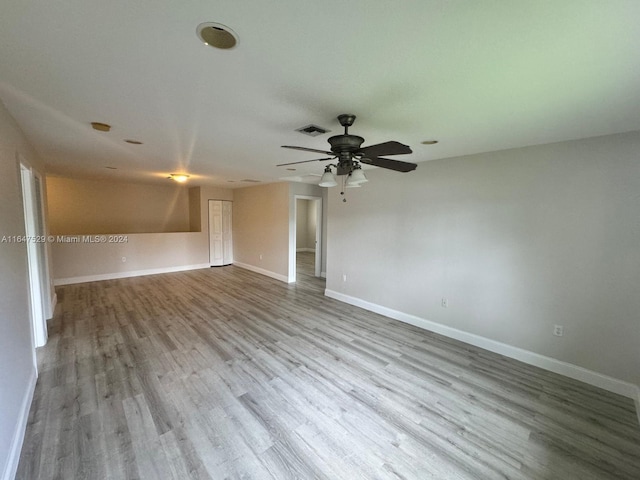 unfurnished bedroom featuring ceiling fan and light hardwood / wood-style flooring