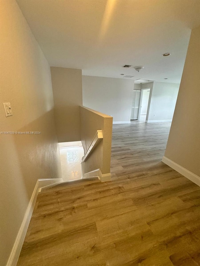 hall featuring hardwood / wood-style floors