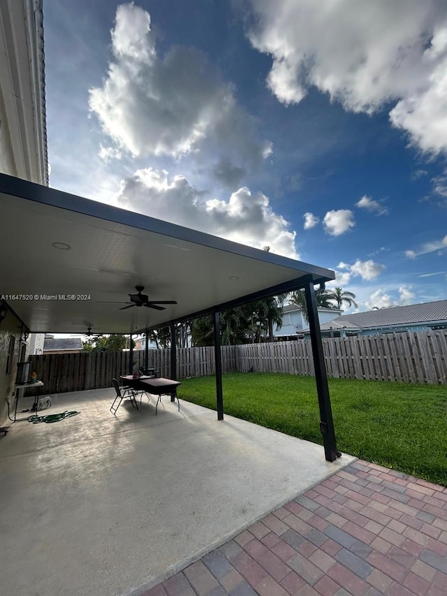 view of patio with ceiling fan