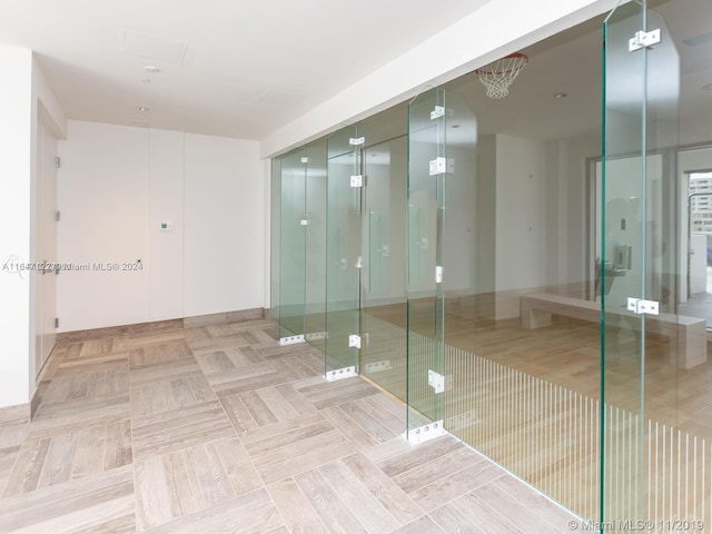 bathroom featuring tile patterned floors and a shower with door