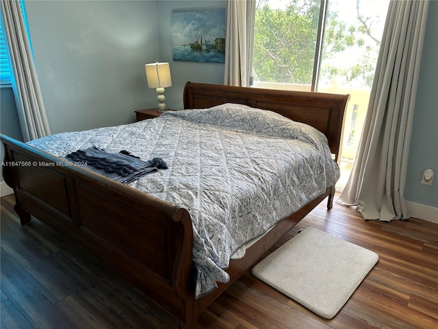 bedroom featuring hardwood / wood-style floors