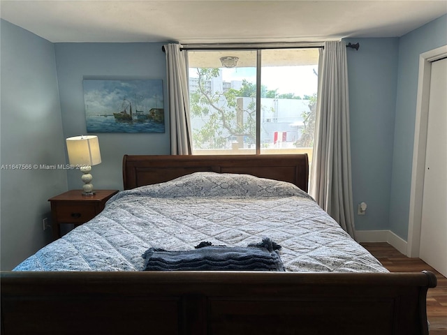 bedroom featuring hardwood / wood-style flooring