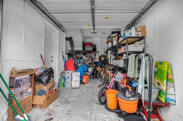 garage featuring concrete block wall