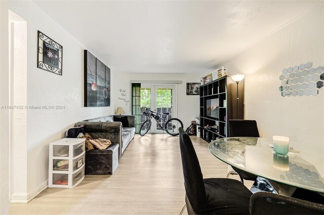 office featuring light hardwood / wood-style flooring and french doors