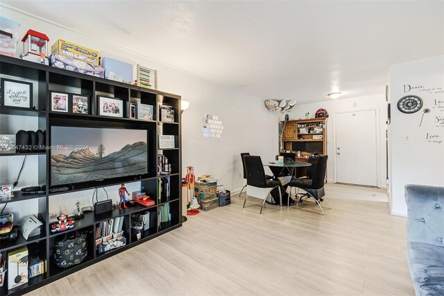 office area with light hardwood / wood-style floors